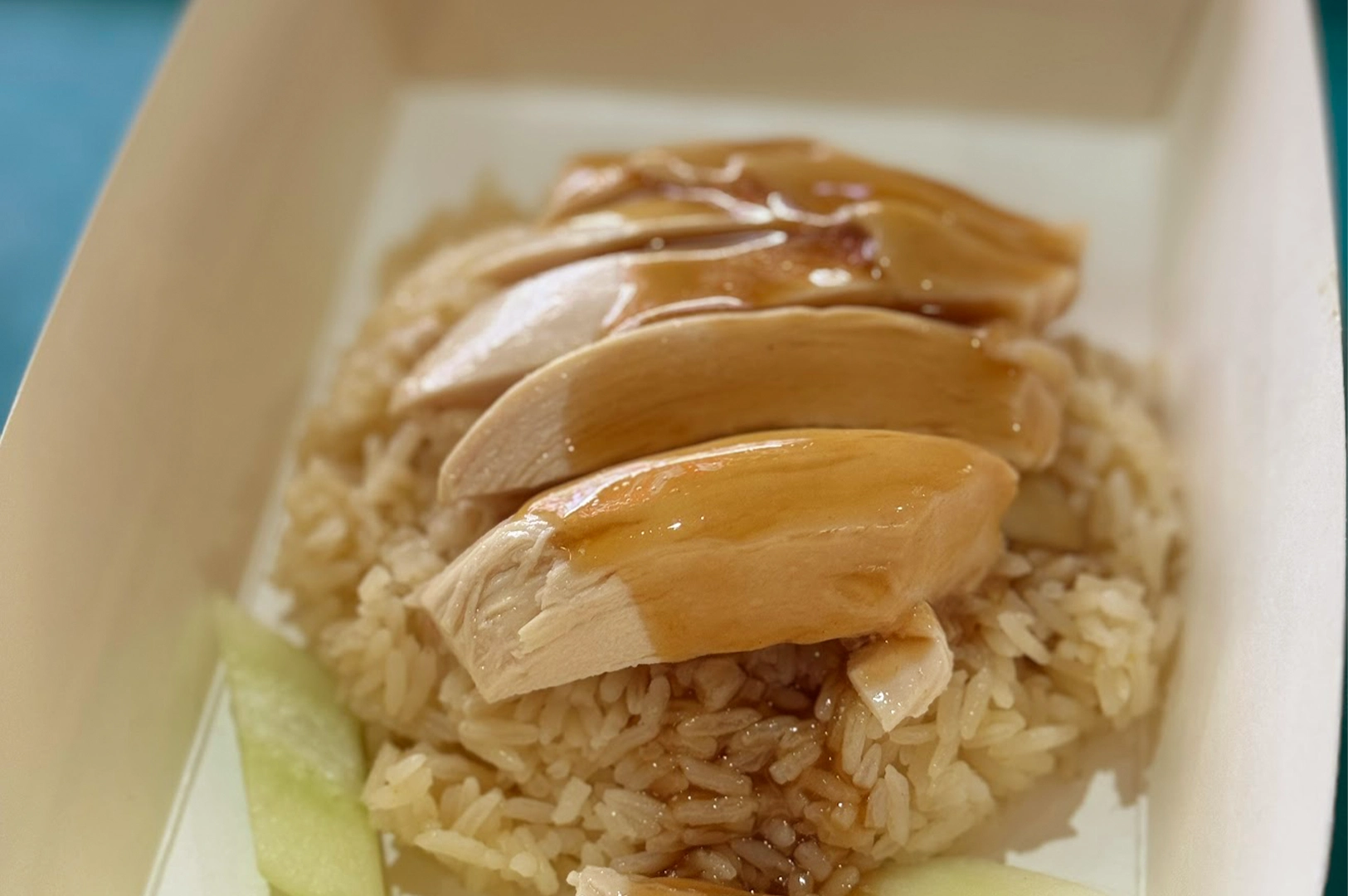 Tian Tian Hainanese chicken rice resting on a table, untouched for a moment.