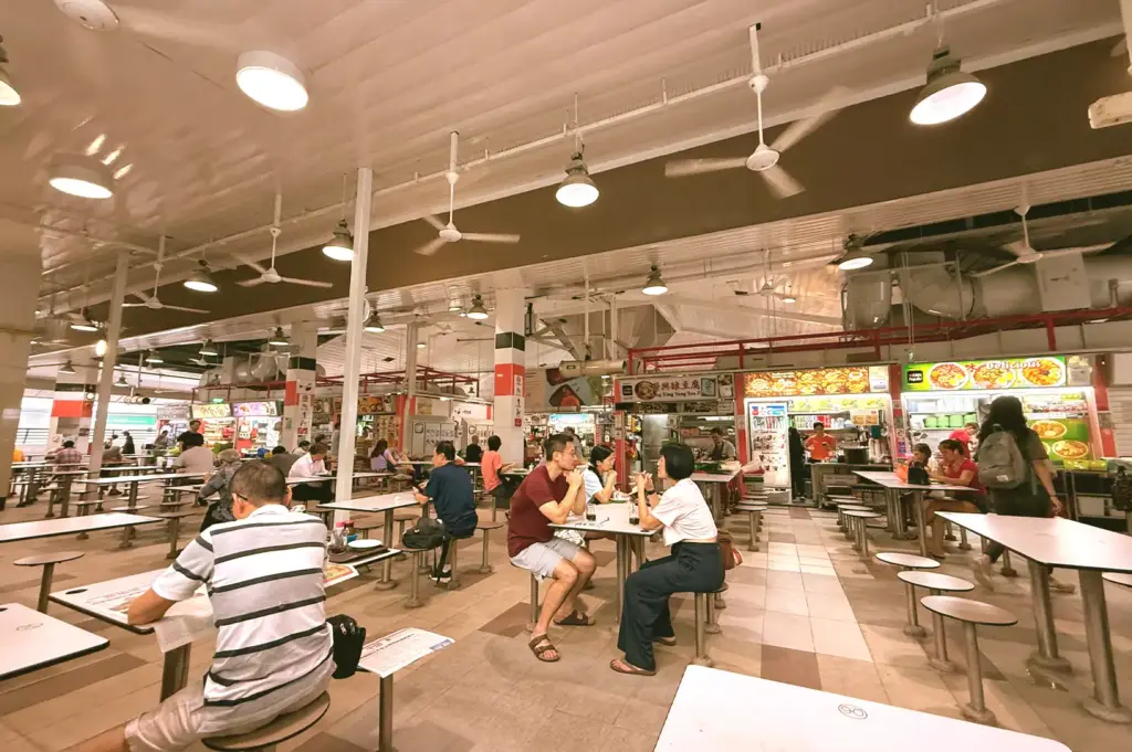 Interior layout with stall rows and seating areas.